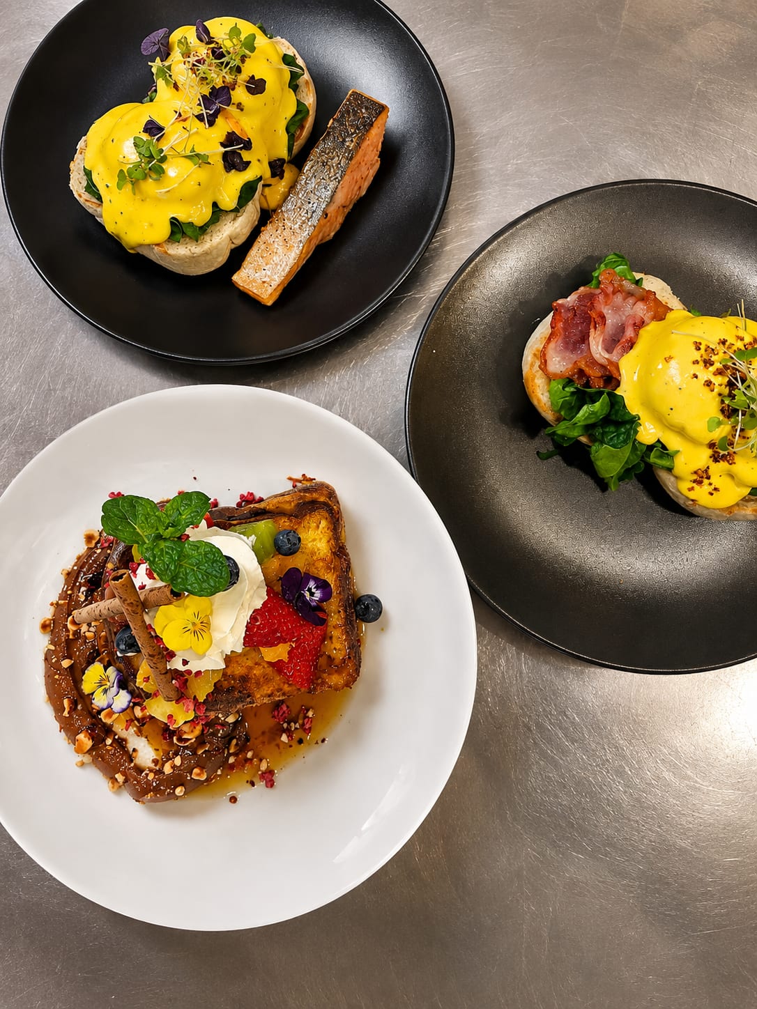 A selection of Belle breakfast dishes with eggs, salmon and French toast